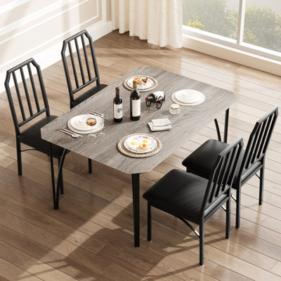 Ensemble de table de salle à manger 5 pièces pour 4 personnes, plateau rectangulaire en panneau de fibres à densité moyenne avec bords chanfreinés, chaises rembourrées en polyuréthane et structure en métal, gris pour les appartements