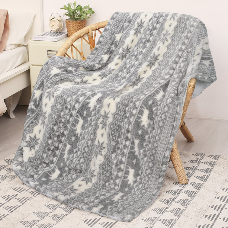 https://assets.wfcdn.com/im/53692995/resize-h755-w755%5Ecompr-r85/2186/218681956/Sherpa+Throw+Blanket%2C+Super+Soft+Warm+Fuzzy+Comfy+Snowflake+Blankets%2C+Reversible+Fluffy+Throws%2C+Holiday+Theme+Blanket+50X60+inches.jpg