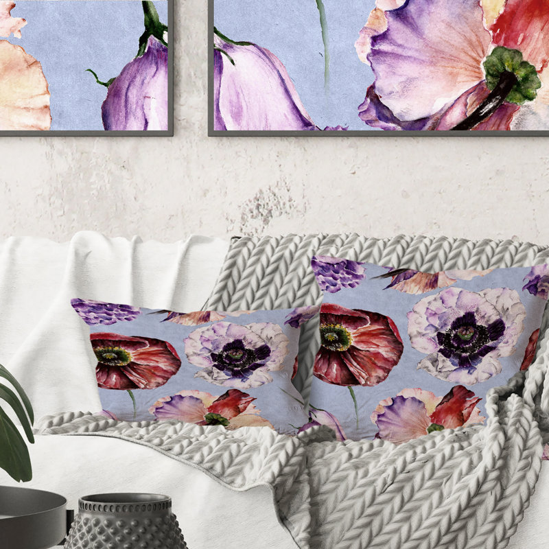 Coussin rouge à motif coquelicots et fleurs blanches sur fond bleu, 18 po x 18 po
