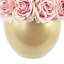 Roses disposées dans un vase rond en céramique