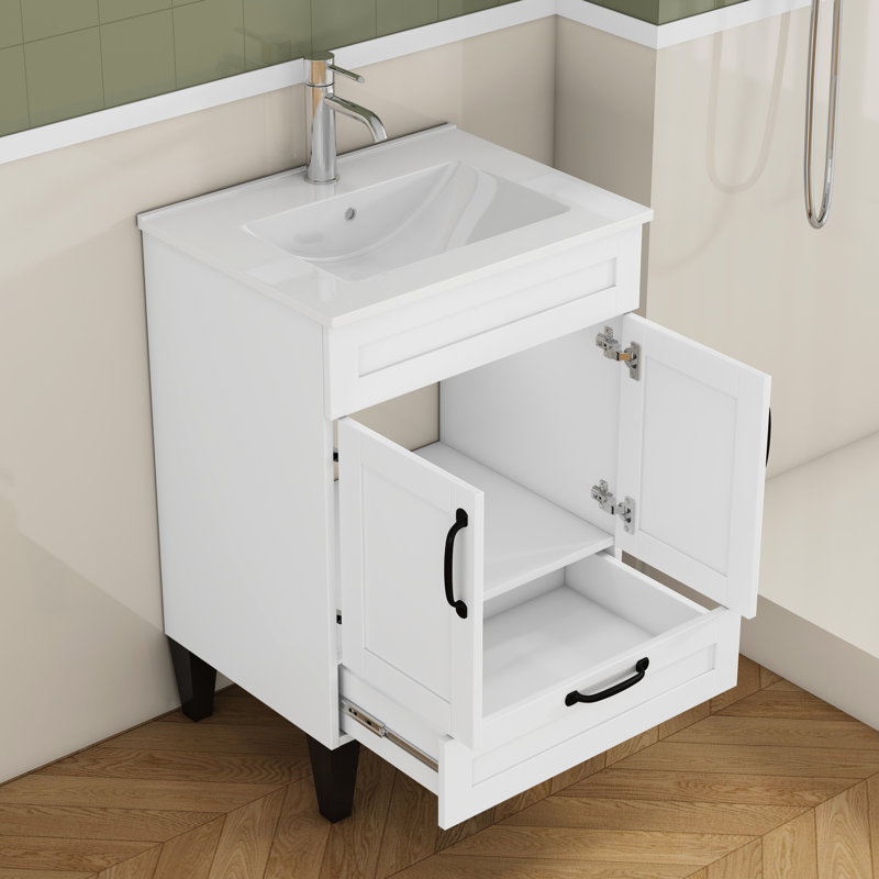 Meuble-lavabo blanc de 24 po avec lavabo, poignées en métal noir, charnières à fermeture en douceur, rangement pour les serviettes