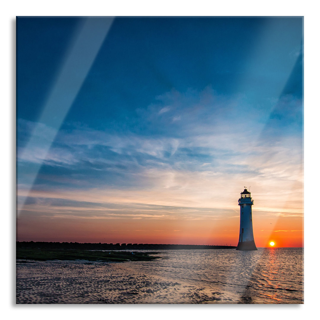 Glasbild Leuchtturm bei Sonnenuntergang