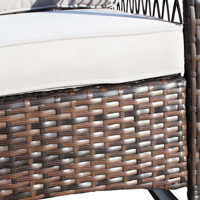 Chaise berçante d'extérieur à large siège avec coussin gris - Cour arrière en tissu protégé