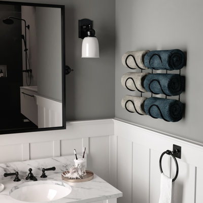 Imroz Wall Mounted Wine Bottle Rack in Black
