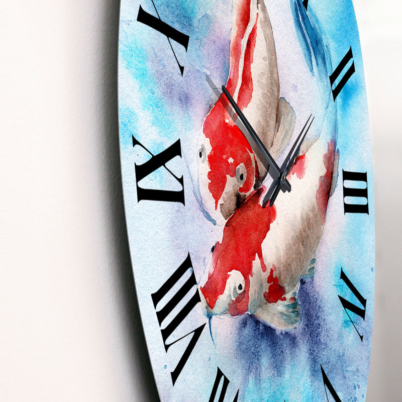 Deux poissons Koi. Taches rouges dans une eau bleue transparente - horloge murale nautique et côtière, Petit