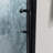 Bi-Fold Semi-Frameless Shower Doors In Matte Black With Clear Glass