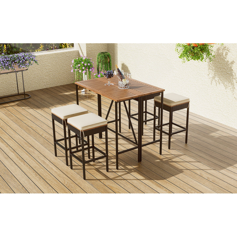 Ensemble de table de salle à manger 5 pièces à hauteur de bar et quatre tabourets avec coussins
