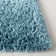 Tapis turquoise à longs poils