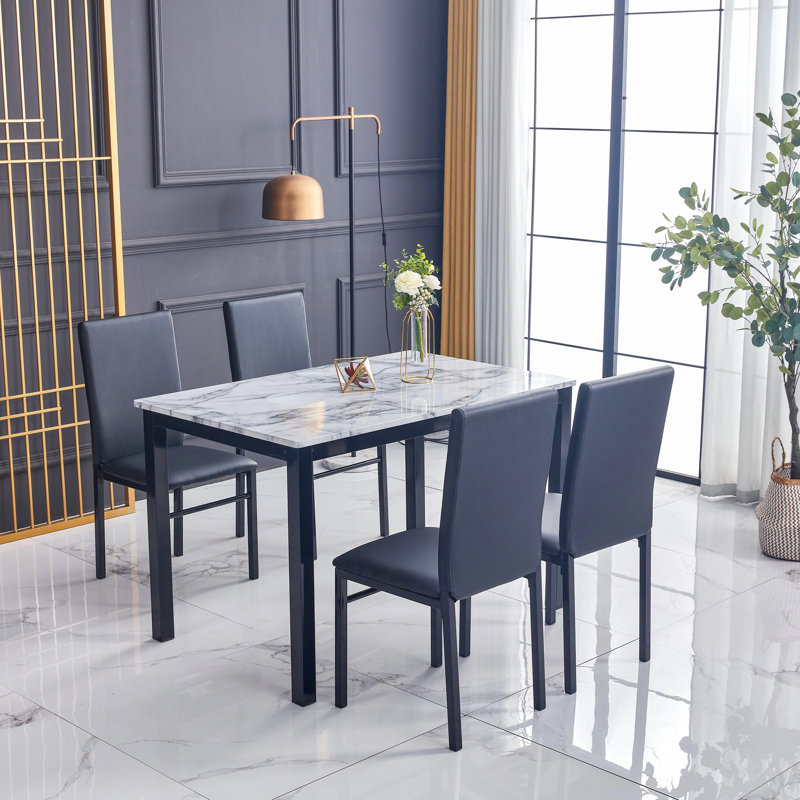 Ensemble repas 5 pièces Aiden en métal noir et finition en faux marbre blanc
