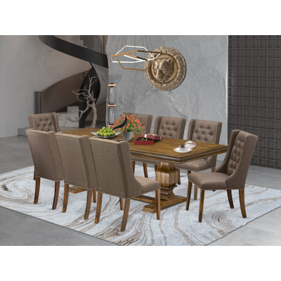 Cet ensemble de cuisine 9 pièces de style Mid-Century comprend une table de salle à manger et 8 chaises de cuisine en tissu de lin brun avec dossier capitonné - finition noyer antique.