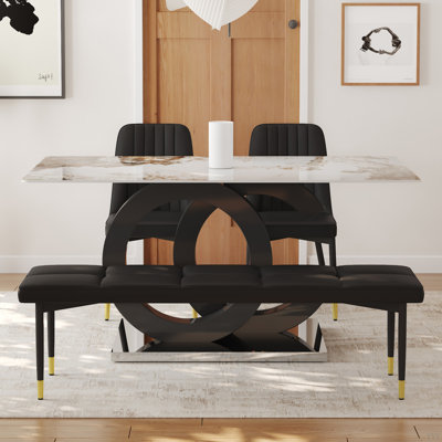 Ensemble table et chaises Ensemble de table de salle à manger en pierre frittée à motif Pandora de 63,5 po.