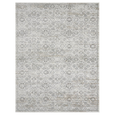 Huseman Beige Faded Medallion Area Rug