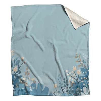 Couvertures bleues à motif floral
