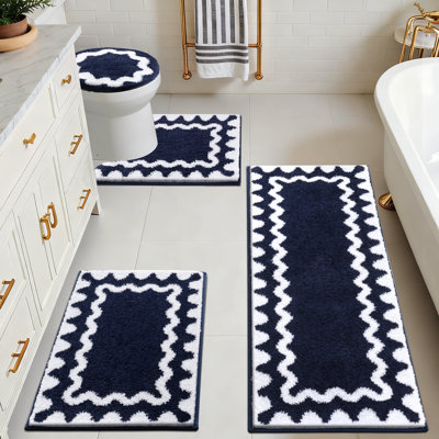  Absorbent Non-Slip Washable Bath Mats (Set of 4)