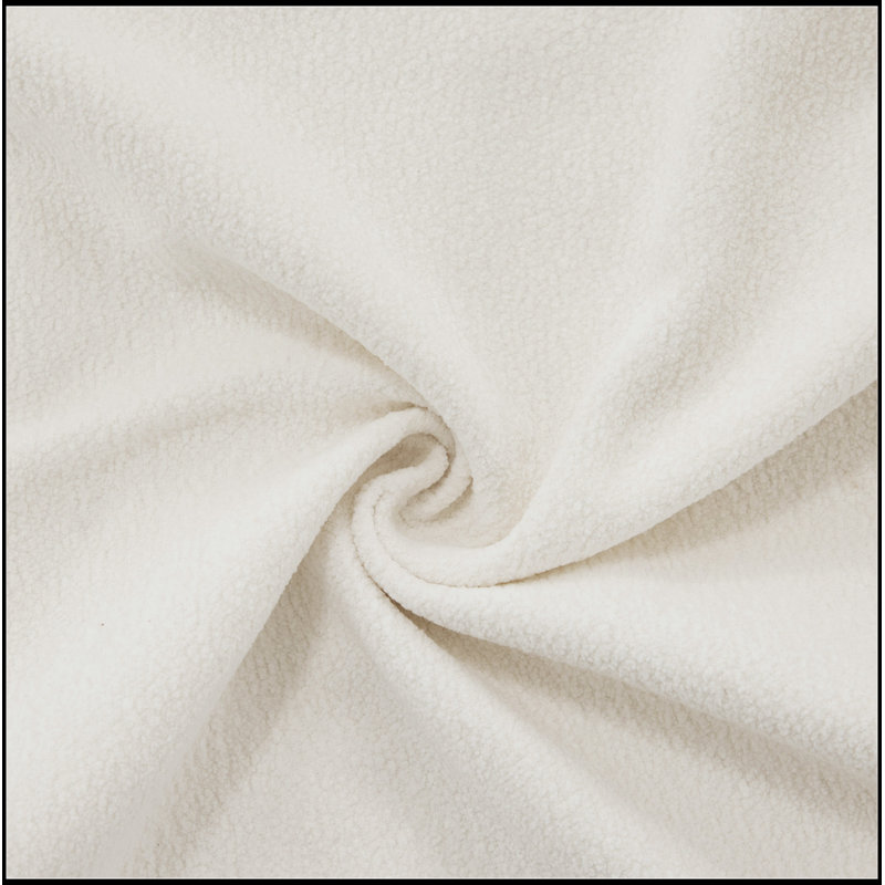 Luxueux canapé en chenille pour le salon avec plusieurs coussins et repose-pieds, améliorant le confort et le style