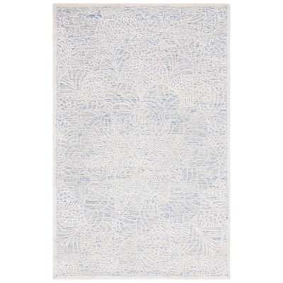 Gorete Hand Tufted Wool/Bamboo Silk/Cotton with Cotton Backing Floral Rug in Blue/Ivory