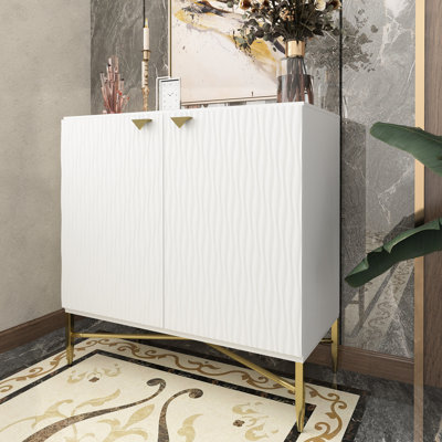 Armoire de luxe blanche à 2 portes avec portes en diamant et tablettes réglables. Soutenu par des chevilles pour plus de stabilité. Convient pour ranger les fournitures de bureau. Pieds dorés lustrés à poids brillant 57,16 lb