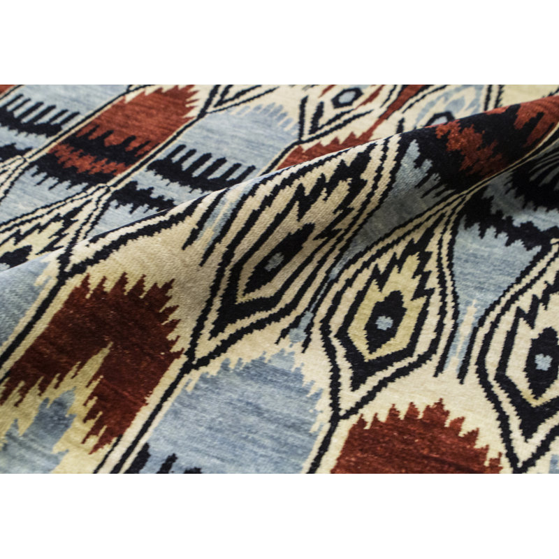 Tapis bleu de haute qualité noué à la main