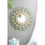 Miroir médaillon en fer forgé avec tentation florale