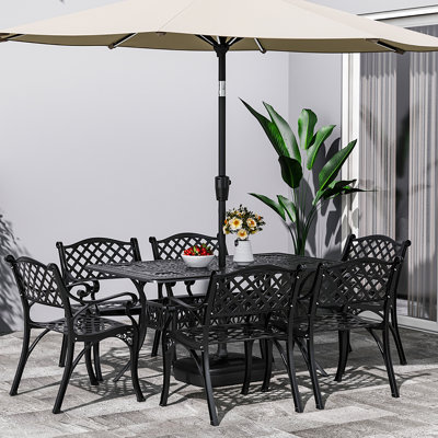 Claudi 6 - Person Patio Dining Set with Rectangular Table , Cushions Included