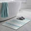 Tapis rayé bleu tissé à la machine-1037886807