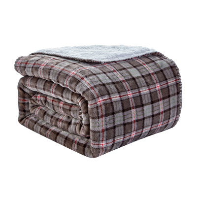 Jeté réversible en tissu écossais