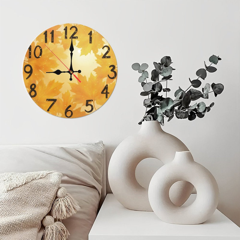 Horloge sur feuilles d'automne