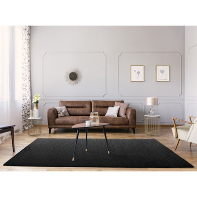 Tapis de surface beige à labyrinthe carrée