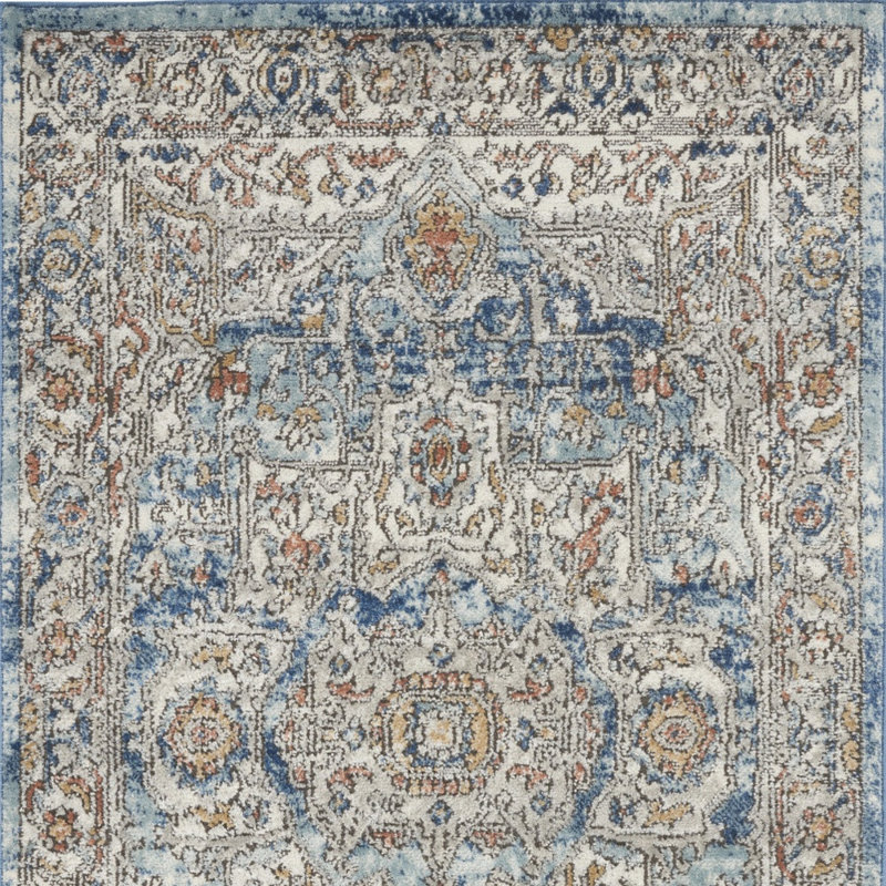 Tapis tissé à la machine ivoire et bleu