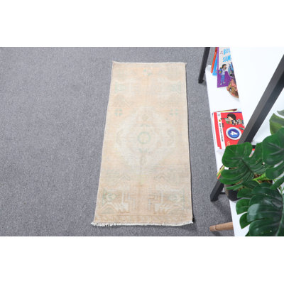 Vintage Turkish Small Beige Entryway Rug Ideal for Bathrooms and Doorways Handcrafted With Faded Oushak Design