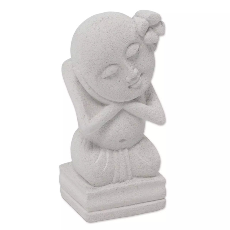 Figurine d'enfant rêveur