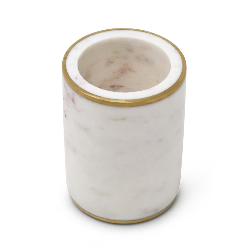 Tasse en marbre blanc avec bordure dorée