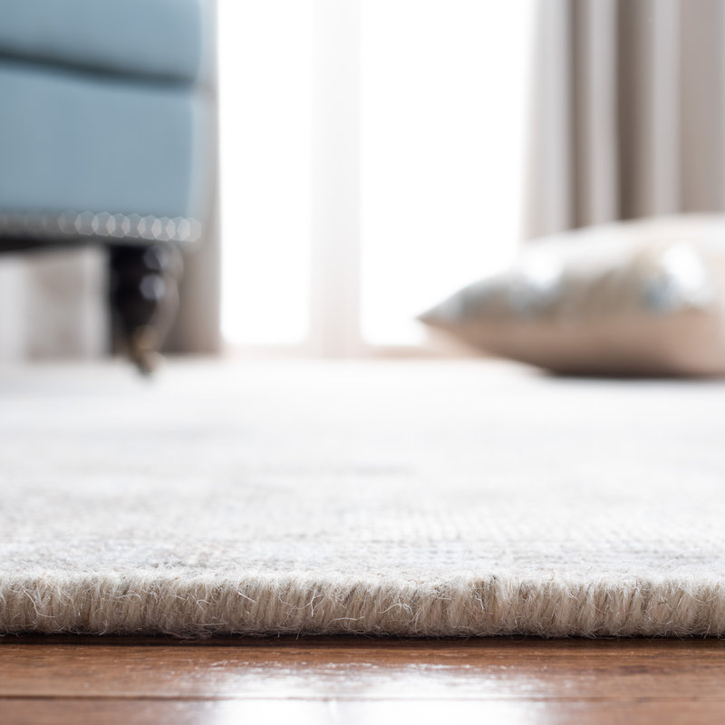 Beige and Sand 9' x 12' Hand-Tufted Wool and Viscose Rug