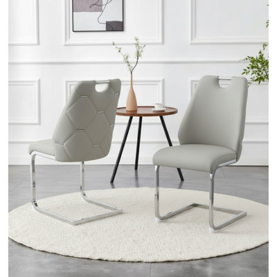 De 2 chaises de salle à manger en cuir PU gris moderne, maille dorée, anneau arrière argenté, poignée, dossier haut, surface teintée, rembourrage en mousse de résilience, conception arquée, structure en fer, patins antidérapants, chaises à assemblage rapide