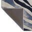 Tapis décoratif moderne à motif abstrait spirale bleu-beige-649610394