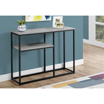Table d'appoint compacte pour chambre à coucher - Stratifié gris avec supports en métal noir, meuble d'appoint polyvalent et peu encombrant pour le salon, design contemporain
