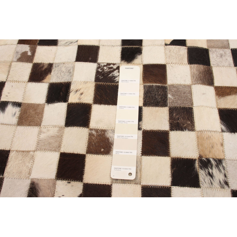 Tapis décoratif en cuir de couleur crème fabriquée à la main à motif Patchwork Arquette