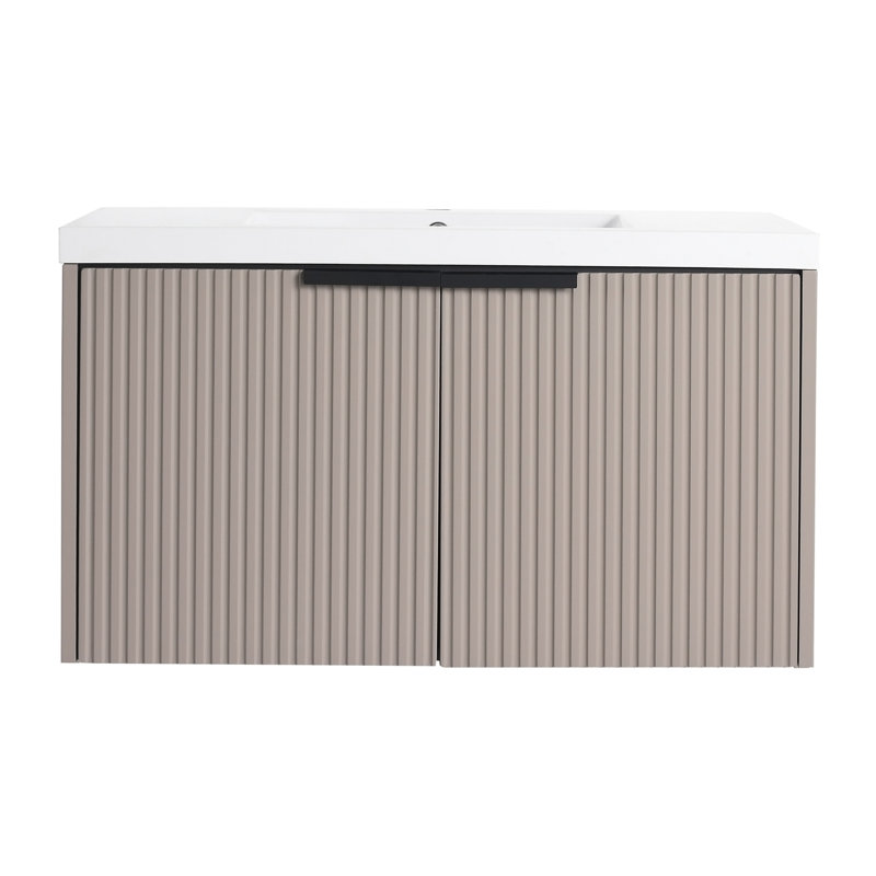 Meuble-lavabo mural avec lavabo en résine et portes à fermeture en douceur, offrant beaucoup de rangement et une conception unique pour améliorer la salle de bain