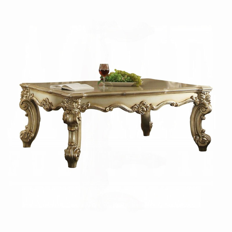 Table basse avec pieds à volutes, Or