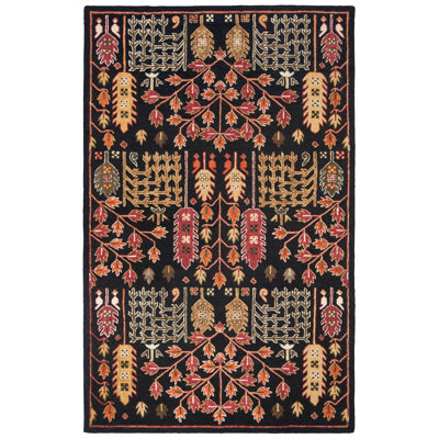 Donnett Hand-Woven Black/Red Southwestern Wool Rug