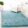 Hermina Light Turquoise Area Rug