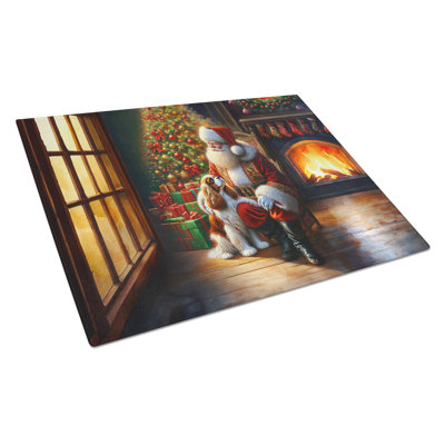 Cavalier Spaniel and Santa Claus Glass Cutting Board