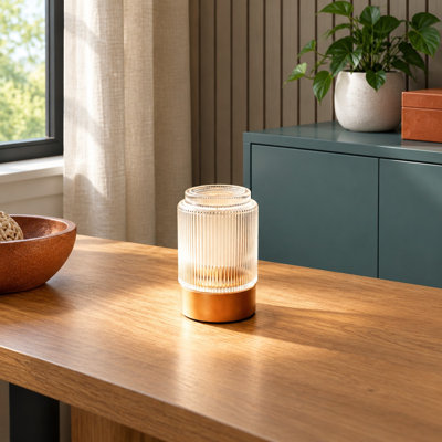Compact glass construction makes this warm-glow night light travel-friendly; it runs cord-free on 2 AAA Batteries and uses a 6-Hour On / 18-Hour Off Timer for bedrooms, bathrooms, desks, bookshelves, and nightstands.