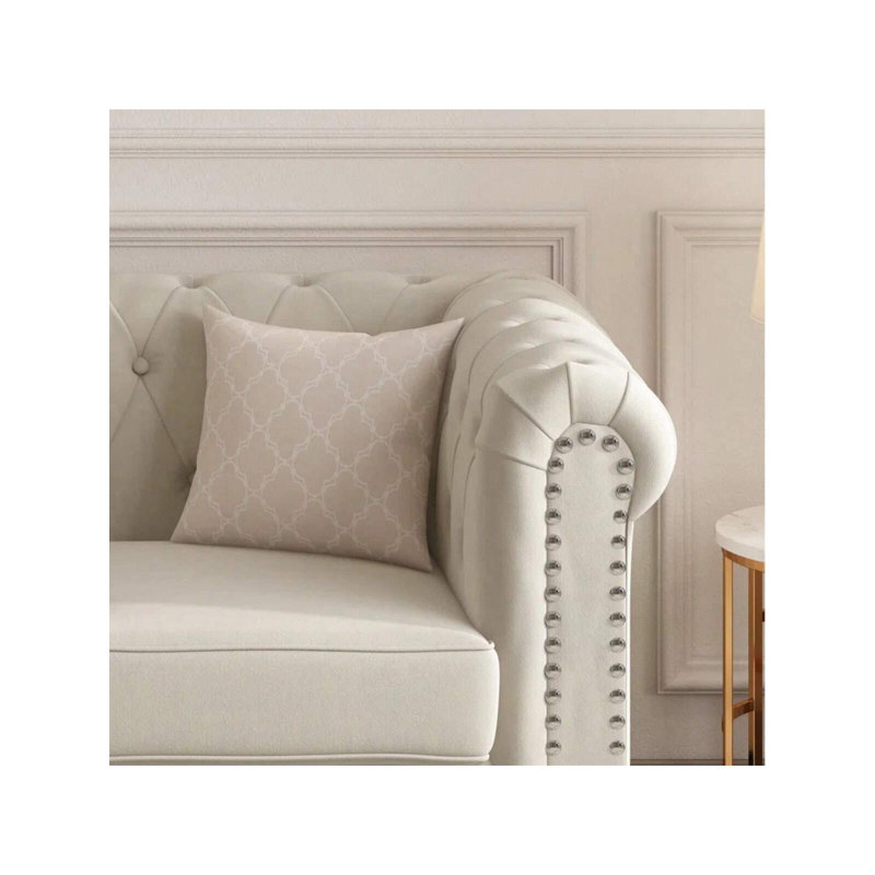 Fauteuil Chesterfield capitonné