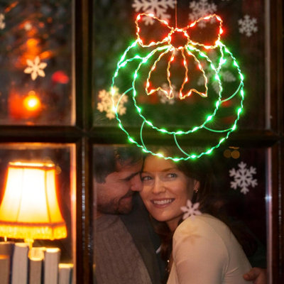 Couronne de Noël lumineuse (1 paquet) pour fenêtres, décoration intérieure avec 80 DEL, télécommande et minuterie, alimentation USB et piles, 8 modes d'éclairage, décoration murale pour les fêtes.