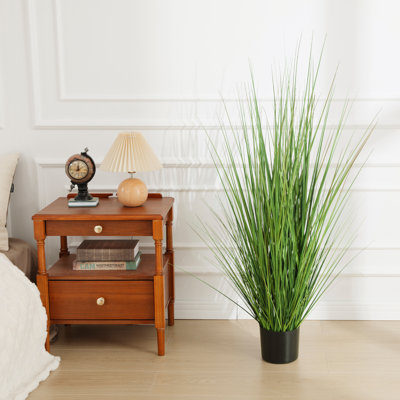 Faux feuillage artificiel en pot