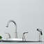 Robinet de cuisine escamotable avec accessoires
