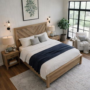 Base de lit plateforme en bois à chevrons avec tête de lit texturée et finition naturelle chaleureuse