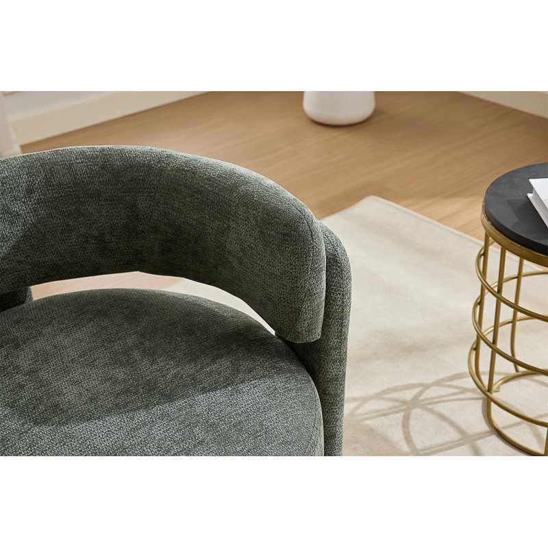 Chaise d'appoint moderne sculpturale avec structure intégrée et siège rembourré confortable, parfait pour les espaces de vie élégants.