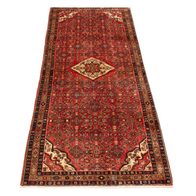 Splendid piece of work that is woven in Turkey with a re-interpretation of village Persian designs. The vintage and distressed look make this hand-knotted wool rug a natural standout.
